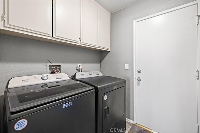 13220 February Dr, Corona, CA 92879 - laundry room with cabinet space and washing machine and dryer