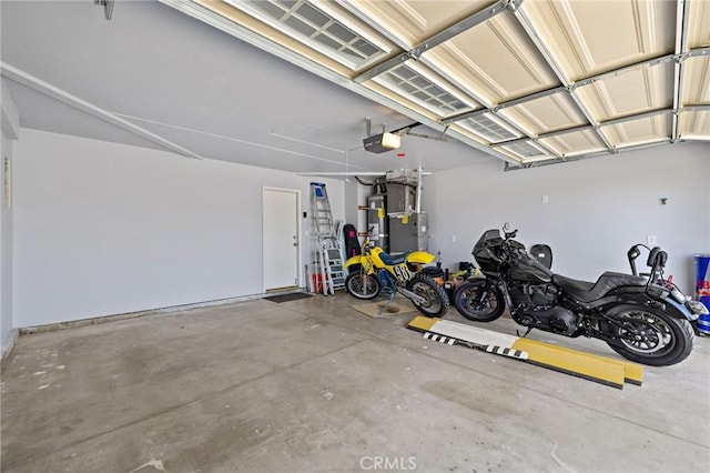 13220 February Dr, Corona, CA 92879 - garage featuring a garage door opener and heating unit