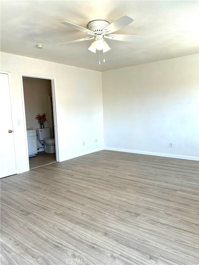 38710 10th St E Unit 12, Palmdale, CA 93550 - unfurnished room with a ceiling fan, light wood-style flooring, and a smoke detector