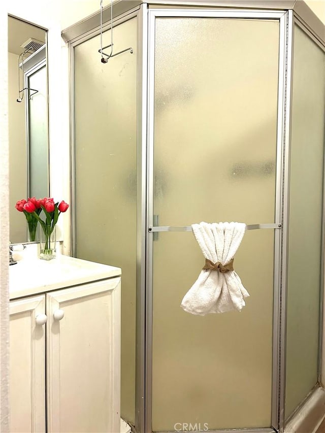 38710 10th St E Unit 12, Palmdale, CA 93550 - full bathroom featuring vanity and a shower stall