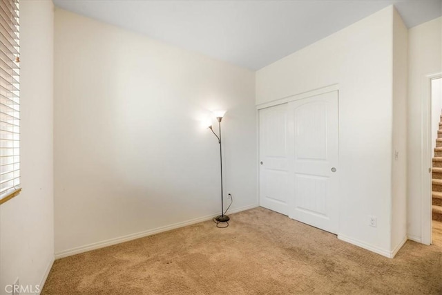 1920 Clementine St, Redlands, CA 92374 - unfurnished bedroom featuring carpet floors and a closet