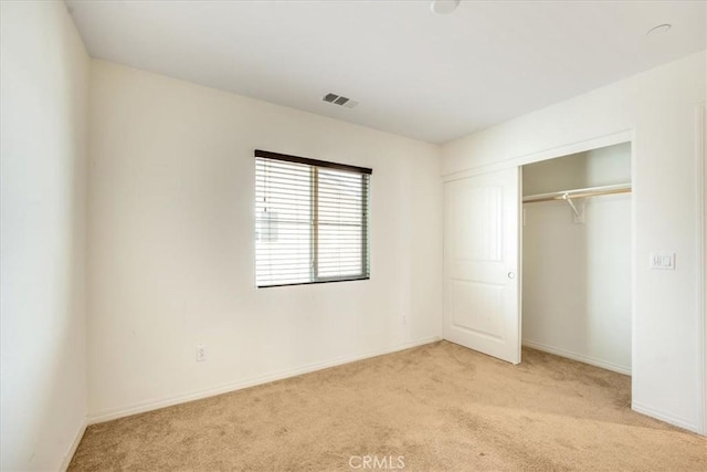 1920 Clementine St, Redlands, CA 92374 - unfurnished bedroom featuring light carpet and a closet