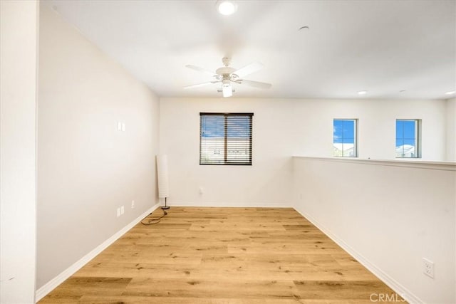 1920 Clementine St, Redlands, CA 92374 - empty room with plenty of natural light, a ceiling fan, light wood-style floors, and recessed lighting