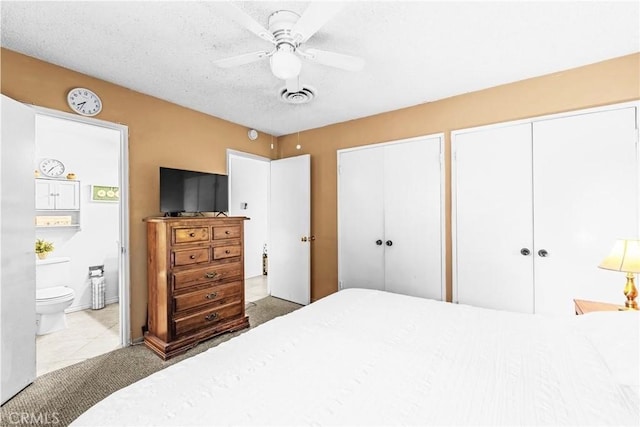 10663 Linden Ave, Bloomington, CA 92316 - bedroom featuring two closets, ensuite bathroom, a ceiling fan, and carpet