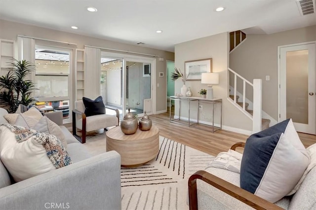 6782 Tahitian Cir, Yorba Linda, CA 92886 - living area featuring stairs, light wood-type flooring, and recessed lighting