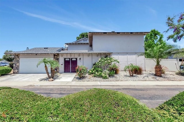 6782 Tahitian Cir, Yorba Linda, CA 92886 - view of front of property featuring an attached garage, concrete driveway, and stucco siding