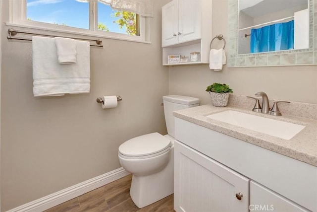 6782 Tahitian Cir, Yorba Linda, CA 92886 - bathroom with vanity, wood finished floors, plenty of natural light, and a shower with shower curtain
