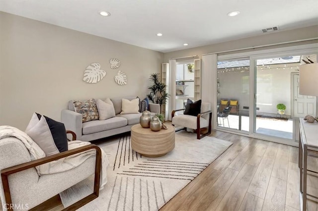 6782 Tahitian Cir, Yorba Linda, CA 92886 - living room featuring wood finished floors and recessed lighting