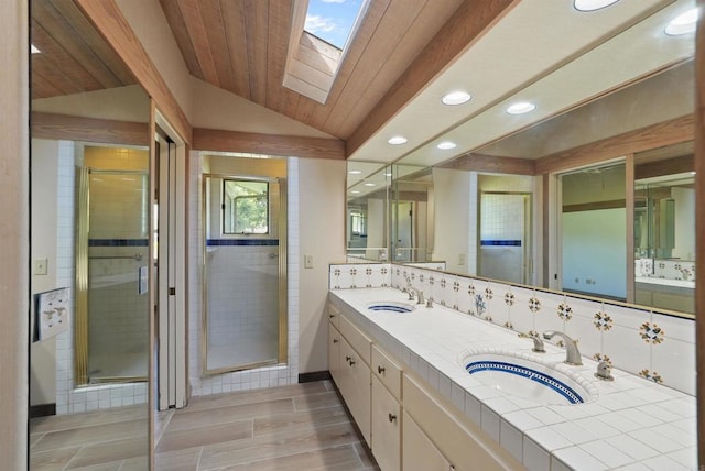 32204 Wiskon Way, Pauma Valley, CA 92061 - bathroom with lofted ceiling, recessed lighting, double vanity, a stall shower, and a skylight