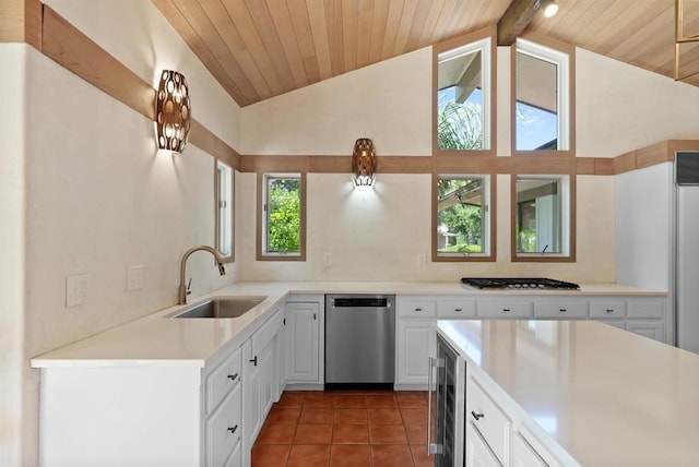 32204 Wiskon Way, Pauma Valley, CA 92061 - kitchen with appliances with stainless steel finishes, beverage cooler, wooden ceiling, tile patterned floors, and white cabinetry