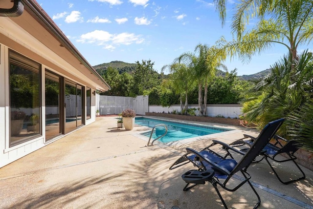 32204 Wiskon Way, Pauma Valley, CA 92061 - view of pool featuring a mountain view, a patio area, and a fenced backyard