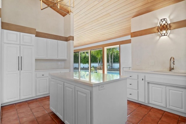 32204 Wiskon Way, Pauma Valley, CA 92061 - kitchen featuring light tile patterned floors, a kitchen island, lofted ceiling, light countertops, and wooden ceiling