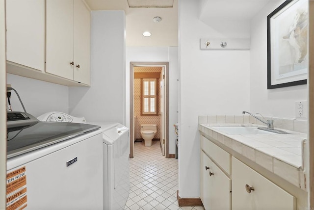 32204 Wiskon Way, Pauma Valley, CA 92061 - washroom with cabinet space, washing machine and dryer, light tile patterned flooring, and recessed lighting