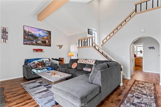 4 Village Unit 2, Lake Arrowhead, CA 92352 - living area featuring wood finished floors, arched walkways, beamed ceiling, stairs, and high vaulted ceiling