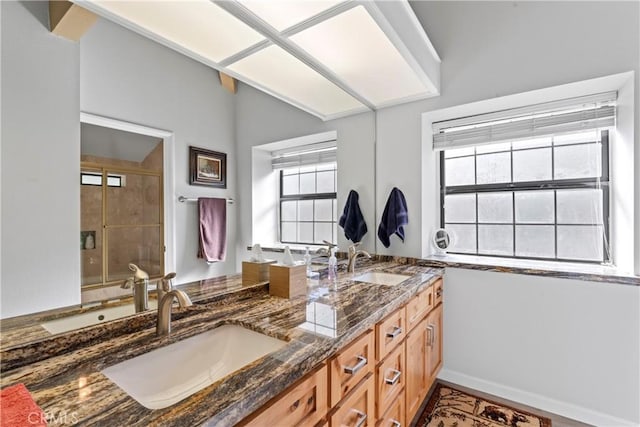 4 Village Unit 2, Lake Arrowhead, CA 92352 - bathroom featuring double vanity and a shower stall