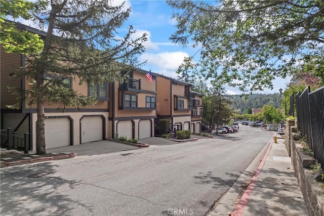 4 Village Unit 2, Lake Arrowhead, CA 92352 - view of asphalt street featuring curbs and sidewalks