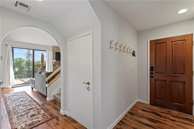 4 Village Unit 2, Lake Arrowhead, CA 92352 - foyer featuring arched walkways, dark wood-style flooring, vaulted ceiling, and recessed lighting