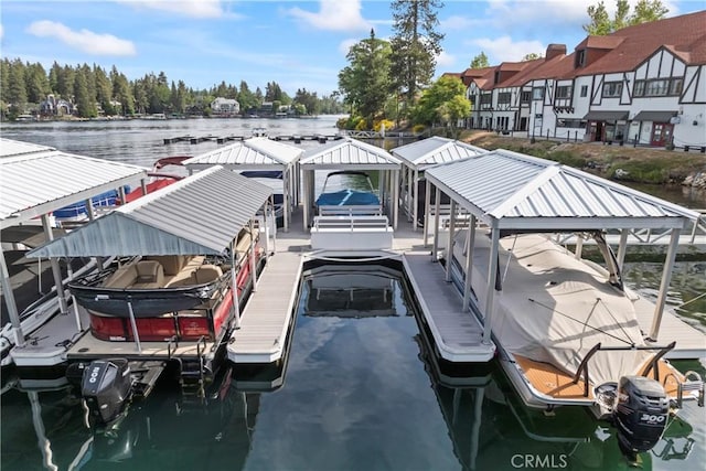 4 Village Unit 2, Lake Arrowhead, CA 92352 - dock area featuring boat lift and a water view