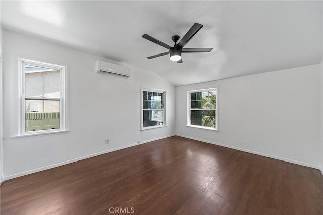 4903 Brayton Ave, Long Beach, CA 90807 - spare room with a wall mounted air conditioner, dark wood-style floors, lofted ceiling, and ceiling fan