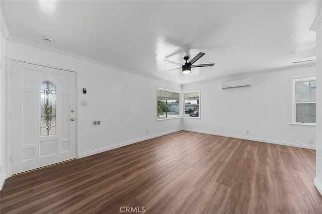 4903 Brayton Ave, Long Beach, CA 90807 - entrance foyer with ceiling fan, dark wood finished floors, an AC wall unit, and crown molding