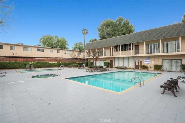 17061 Roscoe Blvd Unit 6, Northridge, CA 91325 - community pool with a community hot tub and a patio
