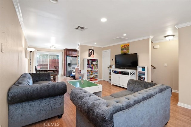 17061 Roscoe Blvd Unit 6, Northridge, CA 91325 - living room with ornamental molding, light wood finished floors, and recessed lighting