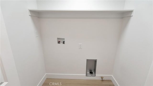 802 S Olive Ave, Alhambra, CA 91803 - laundry room with hookup for a washing machine and light wood finished floors