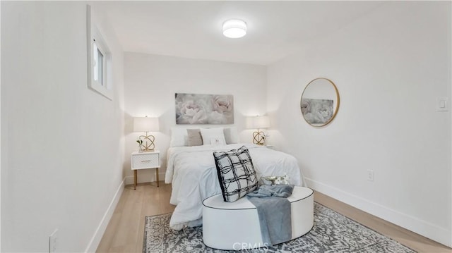 802 S Olive Ave, Alhambra, CA 91803 - bedroom featuring wood finished floors and baseboards