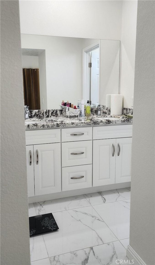 32091 Bayberry Rd, Wildomar, CA 92595 - full bathroom featuring double vanity and marble finish floors