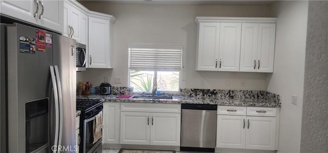 32091 Bayberry Rd, Wildomar, CA 92595 - kitchen with appliances with stainless steel finishes, white cabinets, and light stone counters