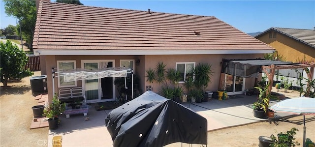 32091 Bayberry Rd, Wildomar, CA 92595 - rear view of house with a patio area, stucco siding, and a tiled roof