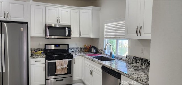 32091 Bayberry Rd, Wildomar, CA 92595 - kitchen featuring stainless steel appliances, white cabinetry, and light stone counters