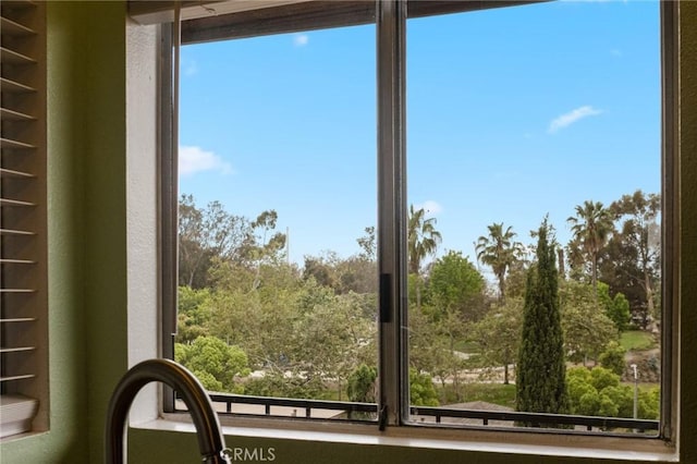 460 Golden Ave Unit 434, Long Beach, CA 90802 - kitchen view of open shelves and a tree filled landscape