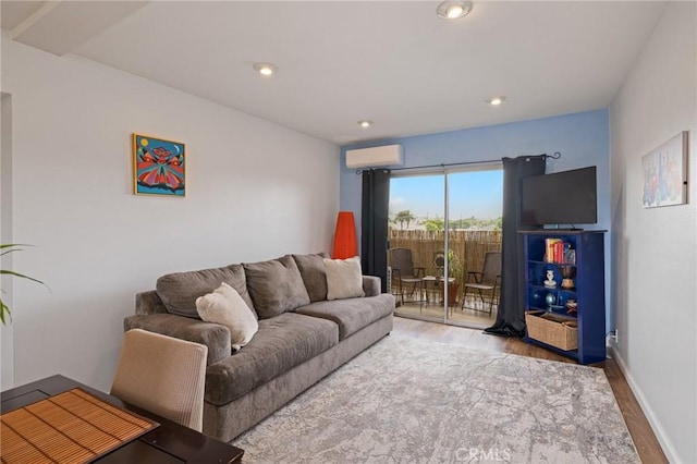 460 Golden Ave Unit 434, Long Beach, CA 90802 - living area with a wall unit AC, wood finished floors, and recessed lighting