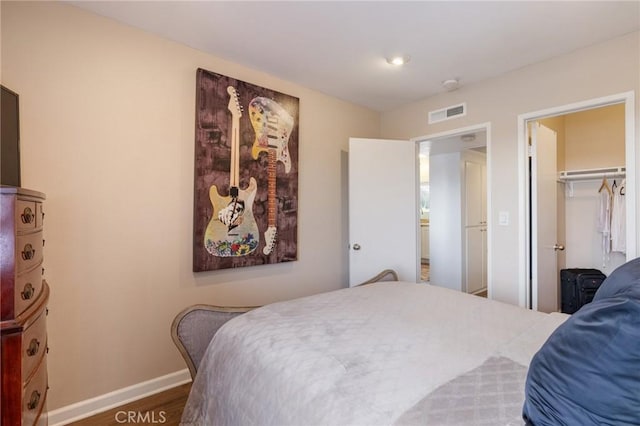 460 Golden Ave Unit 434, Long Beach, CA 90802 - bedroom with baseboards and wood finished floors