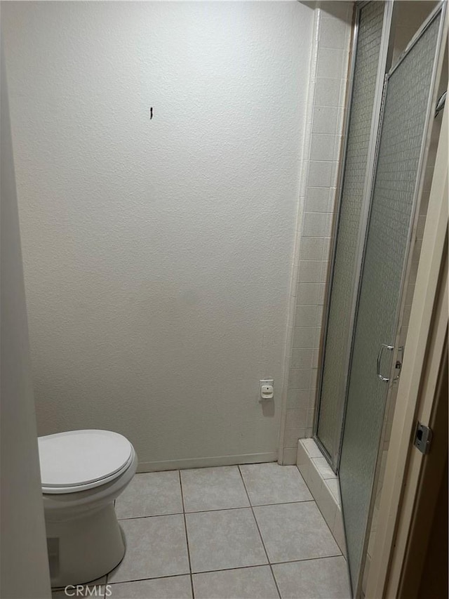 967 Calle Aragon Unit B, Laguna Woods, CA 92637 - full bathroom with a stall shower and tile patterned flooring