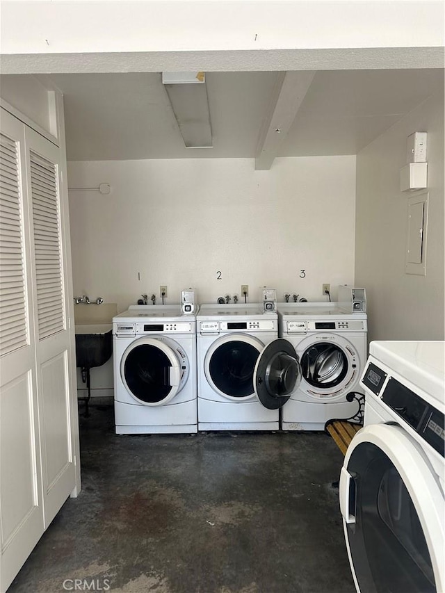 967 Calle Aragon Unit B, Laguna Woods, CA 92637 - shared laundry featuring washer and dryer and electric panel