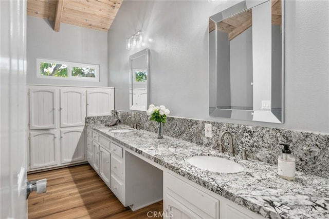 626 Arenas St Unit A, La Jolla, CA 92037 - full bathroom featuring lofted ceiling, double vanity, wood ceiling, and wood finished floors