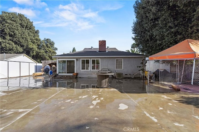 18229 Strathern St, Reseda, CA 91335 - back of property featuring a patio area and a chimney
