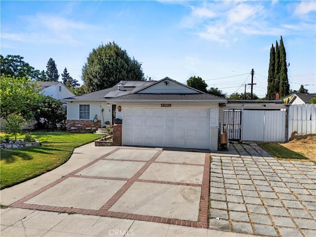 18229 Strathern St, Reseda, CA 91335 - single story home with concrete driveway, a garage, and a shingled roof