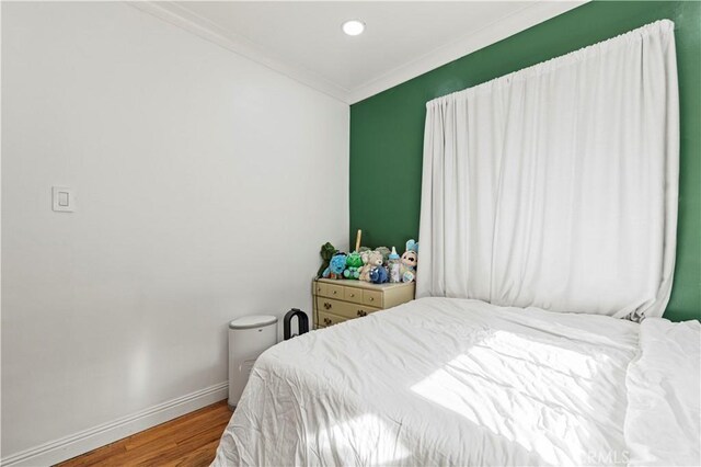 18229 Strathern St, Reseda, CA 91335 - bedroom with wood finished floors, ornamental molding, and recessed lighting