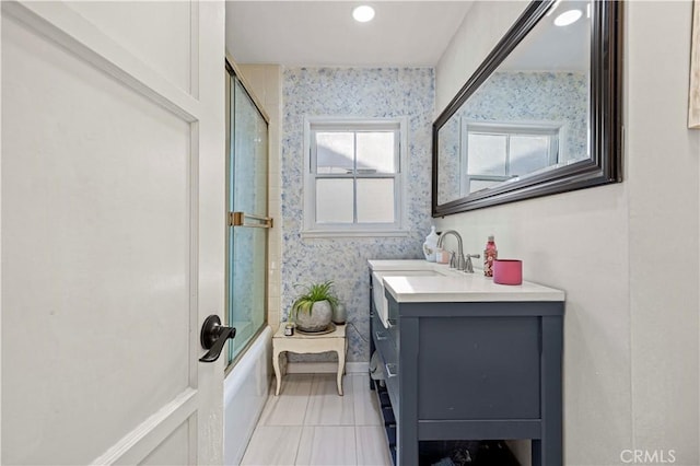 18229 Strathern St, Reseda, CA 91335 - bathroom featuring wallpapered walls, vanity, enclosed tub / shower combo, and tile patterned flooring