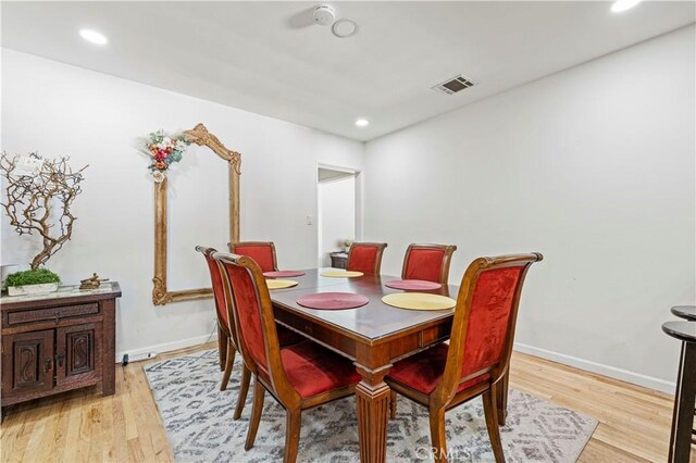 18229 Strathern St, Reseda, CA 91335 - dining room with light wood-style floors and recessed lighting