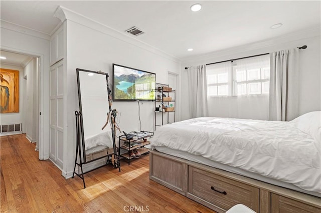 18229 Strathern St, Reseda, CA 91335 - bedroom featuring crown molding, light wood-style flooring, and recessed lighting