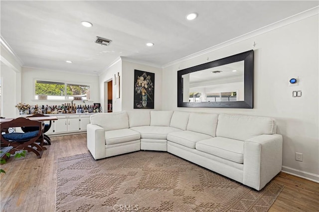 18229 Strathern St, Reseda, CA 91335 - living area featuring ornamental molding, light wood-type flooring, and recessed lighting