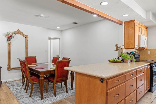 18229 Strathern St, Reseda, CA 91335 - dining area with recessed lighting and light wood finished floors