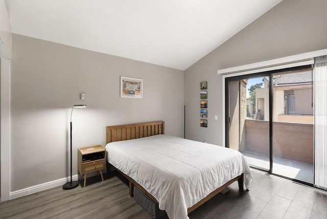 2920 Briarwood Rd Unit G11, Bonita, CA 91902 - bedroom with access to outside, lofted ceiling, and wood finished floors