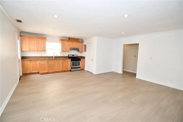 1062 252nd St, Harbor City, CA 90710 - kitchen with gas range, ornamental molding, light wood-style floors, under cabinet range hood, and recessed lighting