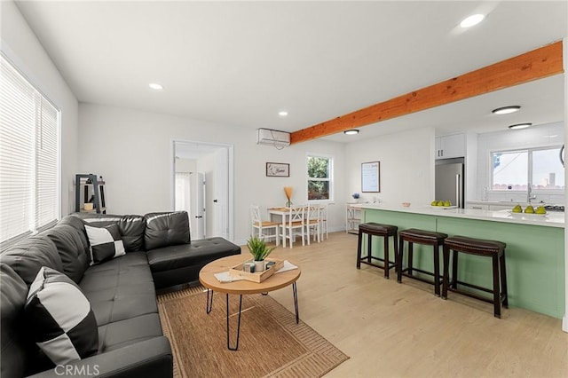 2998 N H St, San Bernardino, CA 92405 - living area with light wood-style flooring, recessed lighting, and beamed ceiling
