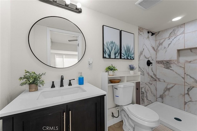 2998 N H St, San Bernardino, CA 92405 - full bathroom with vanity, a marble finish shower, and wood finished floors